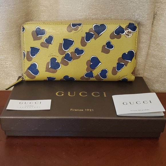 Gucci Handbags - Gucci Chartreuse Heartbeat Print Leather Long Zip Wallet